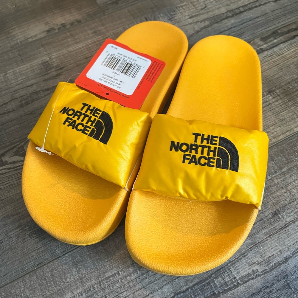 NWT North Face yellow slides/sandals size 7